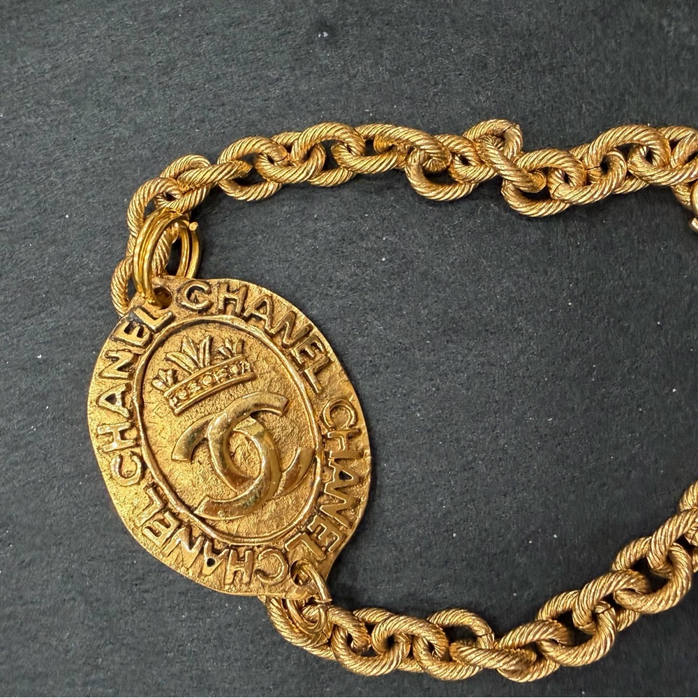 Authentic Chanel Gold toned Crown Medallion with unbranded Bracelet